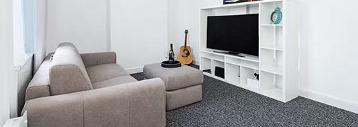 modern bedroom with a neatly made bed fresh white towels and a vintage mirror reflecting a cozy atmosphere for relaxation and comfort 2 bedroom design ideas 2 decor accents