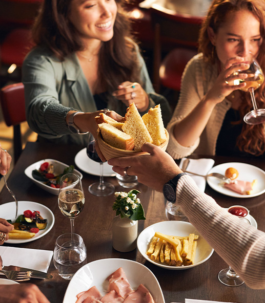 ruins of an ancient castle reflected in calm water with a clear blue sky and trees in the background showcasing historical architecture and natural beauty 4 stunning views 4 historical sites 4 beautiful landscapes